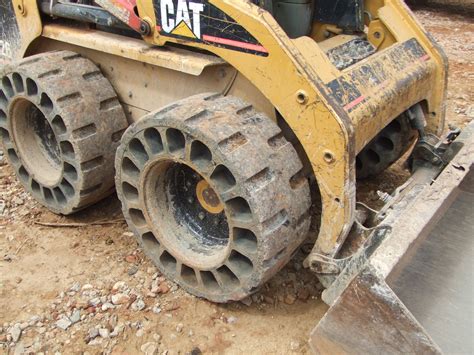 skid steer airless tires|no flat skid loader tires.